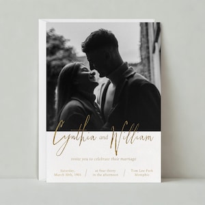 May include: A wedding invitation featuring a black and white photograph of a couple kissing. The invitation is for Cynthia and William, and it states "invite you to celebrate their marriage" on Saturday, 30th March 1901 at four thirty in the afternoon at Tom Lee Park in Memphis.