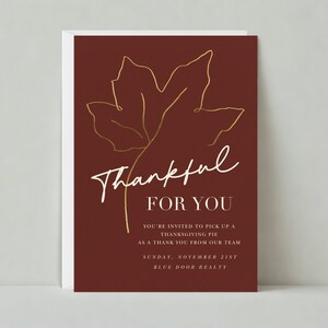 May include: A burgundy Thanksgiving card featuring a gold leaf design and the words "Thankful FOR YOU" in white script. The card invites recipients to collect a Thanksgiving pie. The card is a thank you from a team.