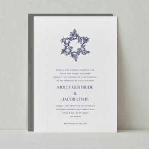May include: A wedding invitation with a blue floral Star of David design. The invitation announces the marriage of Molly Gertrude and Jacob Lewis on Sunday, November 20, 1929 at the Synagogue Adath Israel in the Bronx.