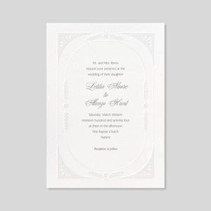 May include: A white wedding invitation with an ornate border and a floral design. The invitation announces the wedding of Letitia Moore to Alonzo Hunt on Saturday, March thirteenth, nineteen hundred and seventy four at three in the afternoon at First Baptist Church, Harlem. Reception to follow.