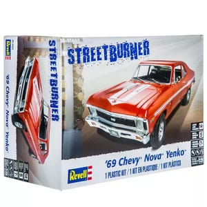 May include: A model car kit box featuring a red 1969 Chevrolet Nova Yenko muscle car. The box has a blue and white "Streetburner" logo and the words "'69 Chevy Nova Yenko" printed on the front.