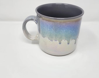 A Retired Meritage Luster Stoneware Mug with a Irredescent Reactive Glaze Finish