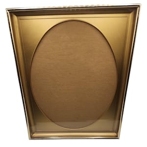 May include: A gold-colored picture frame with an oval opening. The frame has a rectangular shape with angled sides and a gold border. The interior features a brown backing, and the frame is designed to hold a photograph or artwork.