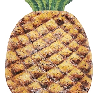 May include: A decorative pineapple-shaped serving platter. The platter has a textured surface with a yellow and brown colour scheme, mimicking a real pineapple. The top has green leaves.