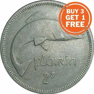 May include: A silver Irish 2 shilling coin with a fish design and the word "Plorín" in Irish Gaelic.