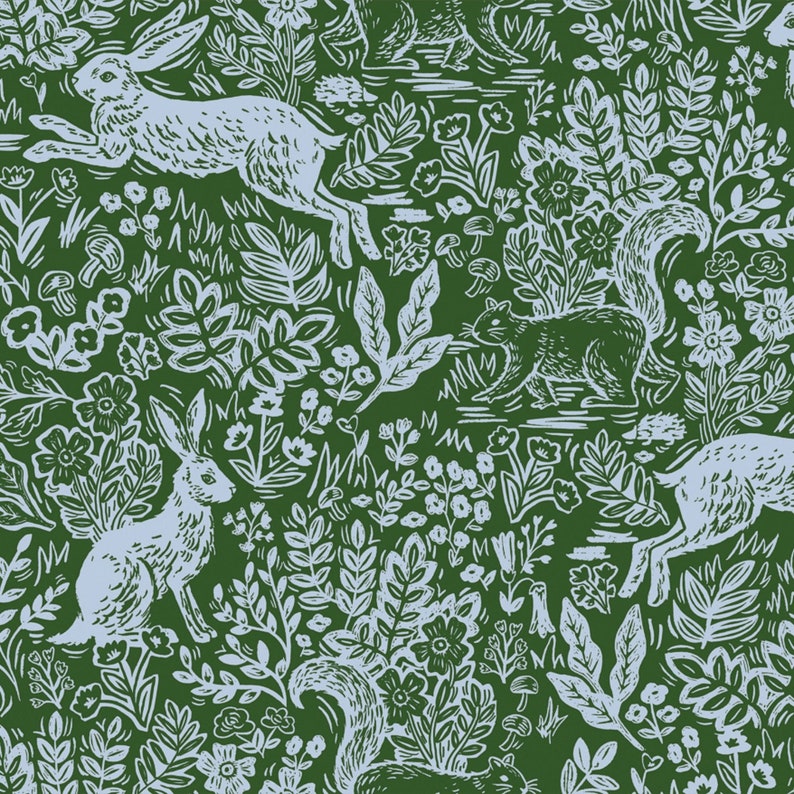 May include: A seamless pattern featuring a green background with blue-grey illustrations of rabbits, squirrels, and various plants. The pattern is reminiscent of a woodblock print.