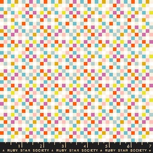 May include: A patterned fabric with a pixelated design. The fabric displays small squares in shades of orange, blue, yellow, pink, and green, set against a cream backdrop. The text "RUBY STAR SOCIETY" is at the bottom.
