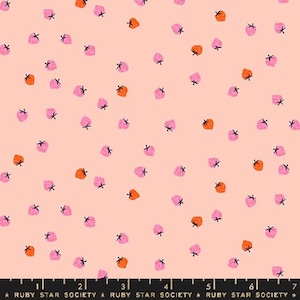 May include: A fabric with a repeating pattern of pink and orange strawberries scattered on a light peach background. The strawberries have black stems. The text "RUBY STAR SOCIETY" is at the bottom.