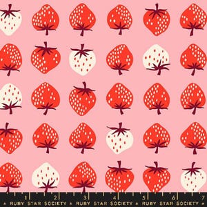 May include: Pink fabric with a repeating pattern of red and white strawberries. The strawberries have green stems and white seeds. The text "RUBY STAR SOCIETY" is at the bottom of the image.