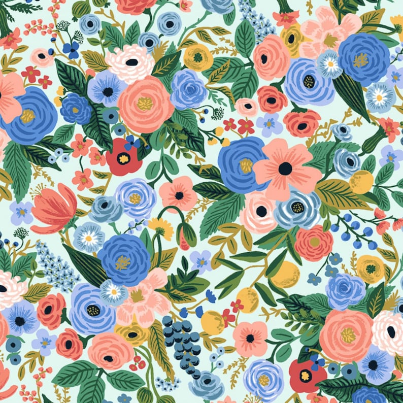 May include: A seamless pattern featuring a variety of colorful flowers, leaves, and berries on a light blue background. The floral design includes pink, red, blue, and yellow flowers, as well as green leaves and berries.