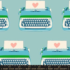 May include: A repeating pattern of teal typewriters with white keys and green accents. Each typewriter has a sheet of paper with a pink heart. The background is a light blue. The text at the bottom reads "RUBY STAR SOCIETY".