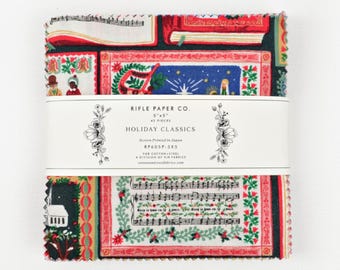 May include: A stack of 42 fabric squares measuring 5x5 inches, titled Holiday Classics by Rifle Paper Co. The fabric features festive illustrations including musical scores, red books, and holiday scenes in red, green, blue, and white colors.