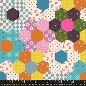 May include: A colorful fabric with a patchwork design featuring hexagonal shapes in various patterns and colors. The patterns include polka dots, floral prints, and geometric shapes. The text "RUBY STAR SOCIETY" is at the bottom.