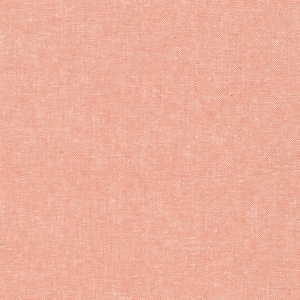 May include: A close-up of a textured, peach-colored fabric. The fabric has a subtle woven pattern.