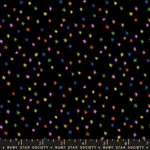May include: Black fabric with a scattered pattern of colorful stars in shades of pink, yellow, green, blue, and orange. The text "RUBY STAR SOCIETY" is printed along the bottom edge of the fabric.