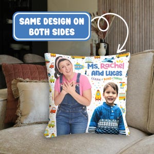May include: A white pillow with a colorful design featuring two people, a woman and a boy. The text on the pillow reads "Ms. Rachel and Lucas. Learn. Bond. Thrive!"