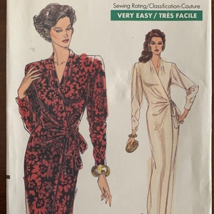 May include: A sewing pattern for a wrap dress with long sleeves. The pattern includes two different styles, one with a floral print and the other in a solid color. The pattern is for sizes 12-14-16. The pattern is labeled "Very Easy Very Vogue" and "7660".