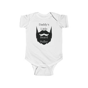 May include: White baby onesie with black text and a black silhouette of a beard and mustache. The text reads "Daddy's Little Beard Puller".