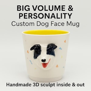 May include: A white ceramic mug with a yellow interior and a 3D sculpted dog face. The dog has black and blue markings, a red tongue, and is decorated with colorful confetti. Text on the mug reads "BIG VOLUME & PERSONALITY Custom Dog Face Mug" and "Handmade 3D sculpt inside & out."