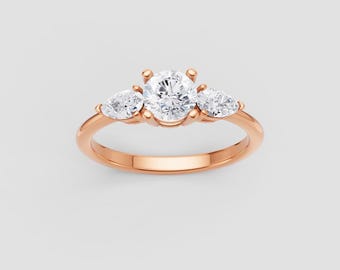 Three Stone Moissanite Ring | 1ct Round + Pear Side Stones | DEF / VVS1 | Rose Gold Engagement | Fuego Jewels