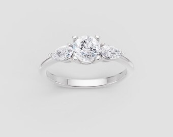 Three Stone Moissanite Ring | 1ct Round + Pear Side Stones | DEF / VVS1 | White Gold Trio Sparkle | Fuego Jewels