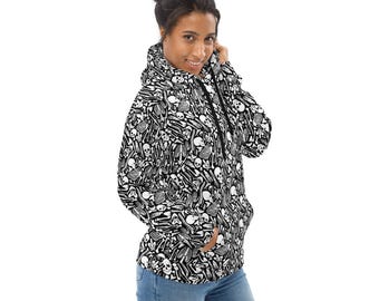 May include: A black hoodie with a white skeleton pattern. The hoodie has a drawstring hood and a kangaroo pocket.