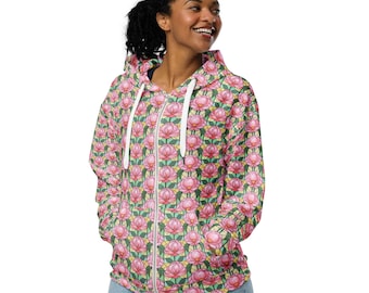 May include: A white zip-up hoodie with a pink and green floral pattern. The hoodie has a hood and a zipper closure.