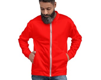May include: A red zippered jacket with white stitching. The jacket has a stand-up collar and two pockets.