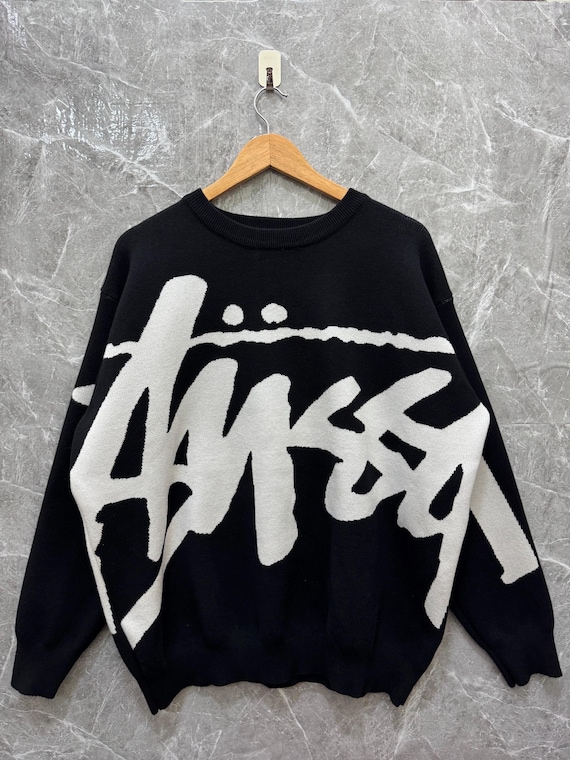 STUSSY・SURMAN ICON SWEATER Stussy Surfman Icon Sweater FA24 Dusty Blue Brown Ivory