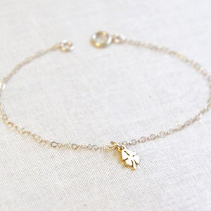 Four Leaf Clover Bracelet Tiny Lucky Charm Bracelet in Gold or Silver image 1