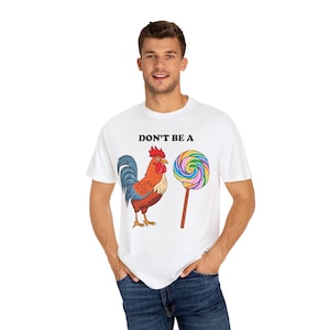 Don&#39;t Be a Chicken Unisex T-Shirt | Funny Rooster Graphic Tee | Gifts for Farmers | Humor Apparel | Playful Weekend Wear | Sarcastic Shirt