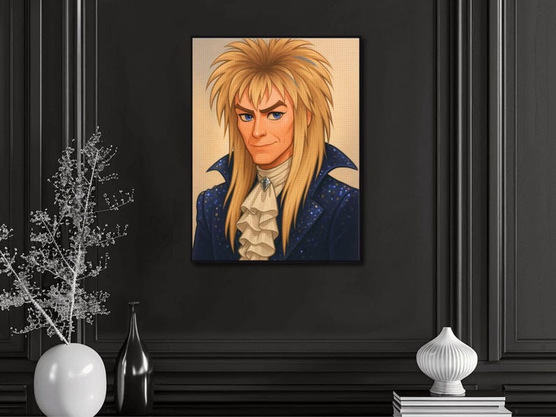 May include: Portrait art print of a man with long, blonde hair and blue eyes. He wears a dark blue jacket with a white ruffled shirt and a decorative pin. The artwork is displayed on a wall.
