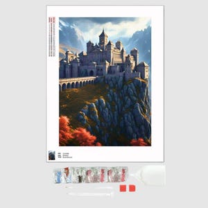May include: A diamond painting kit featuring a detailed illustration of a castle perched on a cliffside. The artwork showcases a majestic castle with multiple towers, a bridge, and vibrant autumn foliage. The kit includes diamond beads, tools, and a canvas.
