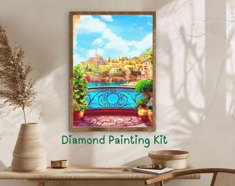 May include: Diamond painting kit featuring a colorful image of a balcony overlooking a blue body of water with a cityscape in the background. The balcony has a wrought iron railing and is decorated with potted plants.