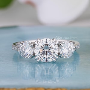 Colorless Three Moissanite Round Cut Engagement Ring With Pave Set Side Stones Past Present Future Womens Ring