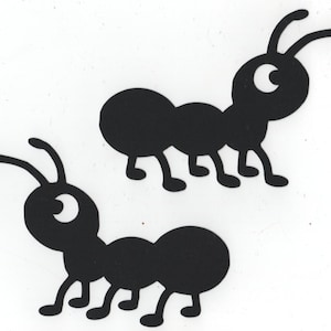 May include: Two black silhouette ants with large eyes and six legs. The ants are facing different directions.