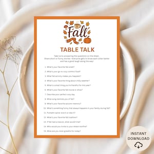 May include: An orange-bordered printable "Fall Table Talk" game sheet. The sheet features fall-themed illustrations and prompts for conversation starters. The text includes questions about favorite fall smells, activities, and traditions. "Instant Download" is also displayed.