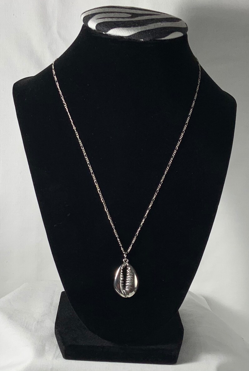 FREE Gift with purchase of 35 dollars or more FREE Gift with this purchase Sterling silver Solid Cowrie Shell necklace image 1