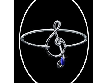 FREE Gift with 35 dollar purchase or more Music Note Jewelry Treble Clef Bracelet Sterling Silver with blue stone.