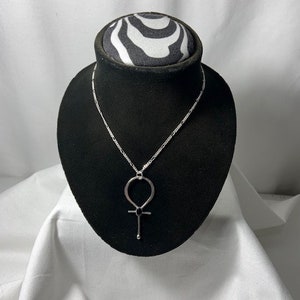 FREE Gift with purchase of 35 dollars or more FREE Gift with this purchase Sterling silver with Black onyx Ankh Necklace