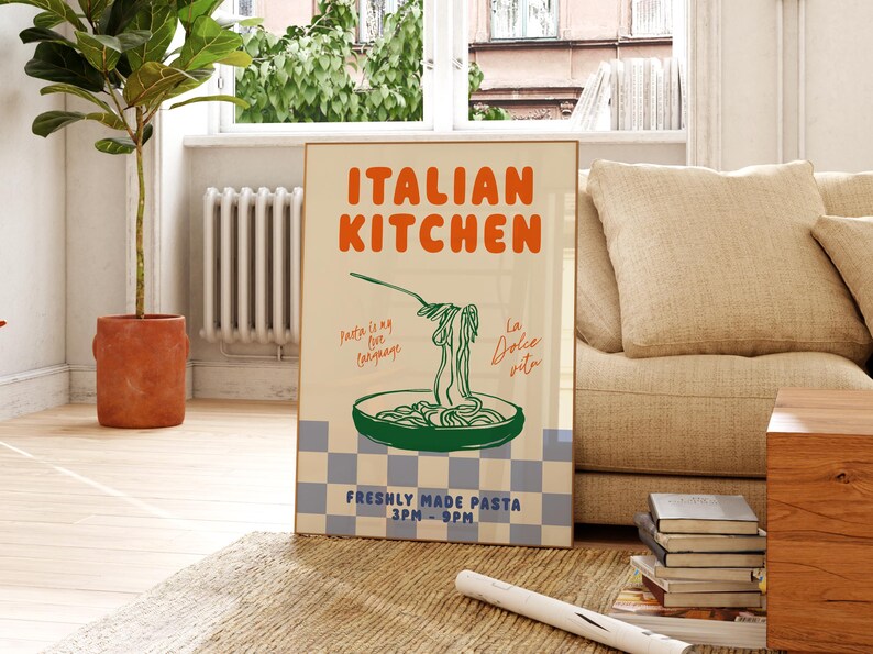 May include: A vintage-style poster advertising an Italian kitchen. The poster features a blue and white checkered background with the text "ITALIAN KITCHEN" in orange and green. The poster also features a drawing of a bowl of pasta with the text "Pasta is my love language" and "La Dolce Vita" in cursive.