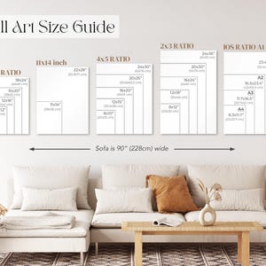 May include: A wall art size guide with various print ratios and dimensions, including 11x14 inch, 24x36 inch, and A1-A4 sizes. The guide is displayed above a sofa that is 90 inches wide.