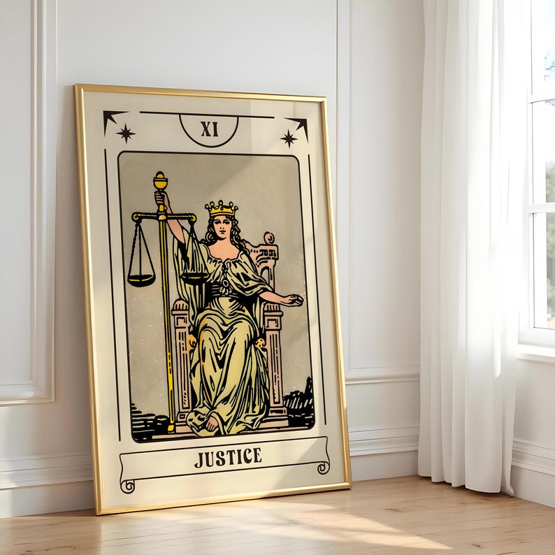 May include: A framed tarot card print featuring the Justice card. The artwork depicts a robed figure with a crown, holding scales and a sword, seated on a throne. The card is labeled "JUSTICE" at the bottom and "XI" at the top.