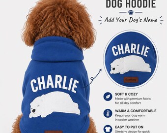 May include: A blue dog hoodie with the name "CHARLIE" in white block letters. A white graphic of a sleeping bear is below the name. The hoodie is labeled "Soft & Cozy", "Warm & Comfortable", and "Easy to Put On".