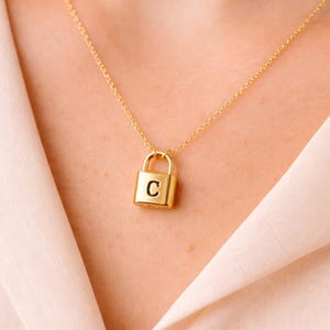 May include: A handmade, wooden serving tray with a natural finish. The tray features a rectangular shape with raised edges and integrated handles. The wood grain is visible, showcasing the tray's craftsmanship. Dimensions are approximately 16 inches long, 10 inches wide, and 2 inches high.