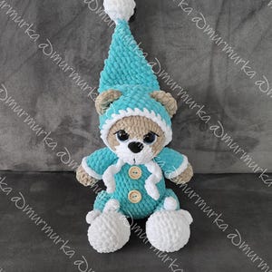 Amigurumi bear. Teddy bear in pajamas. Cute crochet amigurumi, handmade toy.