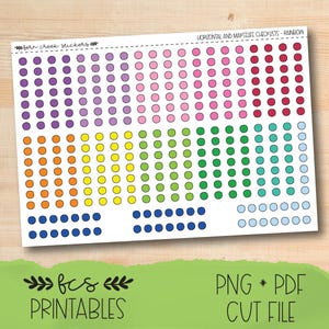 May include: A sheet of rainbow-colored stickers with rows of small circles. The stickers are arranged in a rainbow pattern, with colors including purple, pink, red, orange, yellow, green, blue, and teal. Text at the bottom reads "fcs PRINTABLES" and "PNG * PDF CUT FILE".