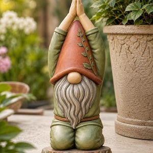 May include: A garden gnome figurine in a kneeling position with hands pressed together above the head. The gnome wears a tall terracotta-colored hat with a vine detail, a green tunic, and has a long grey beard. It stands on a circular base.