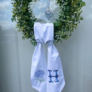 Custom embroidered wreath sash