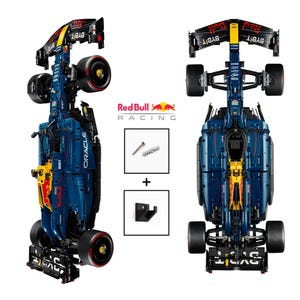 Peut inclure: Maquette détaillée d'une voiture de Formule 1 Red Bull Racing, principalement bleu marine avec des accents rouges et jaunes. Le modèle comprend des composants mécaniques, des logos de sponsors et le logo Red Bull Racing. Matériel de montage inclus.